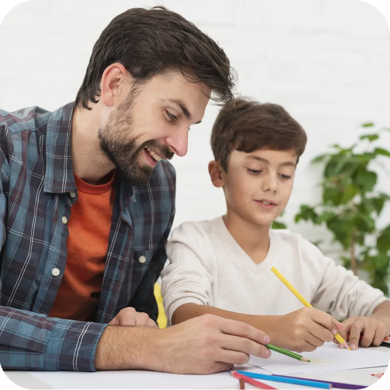 A mentor helping a child with their studies